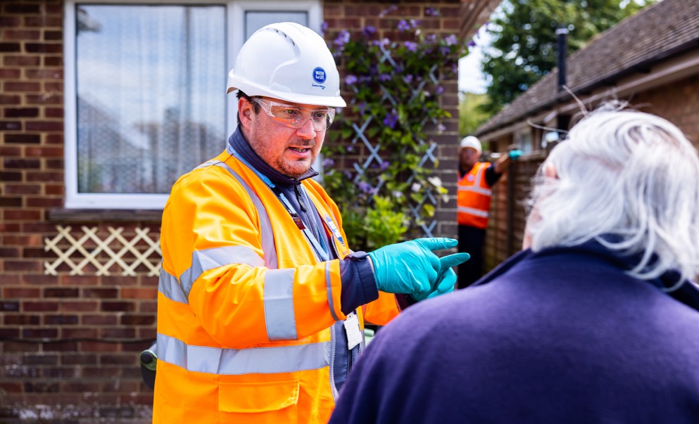 Worker having a conversation with an elderly person